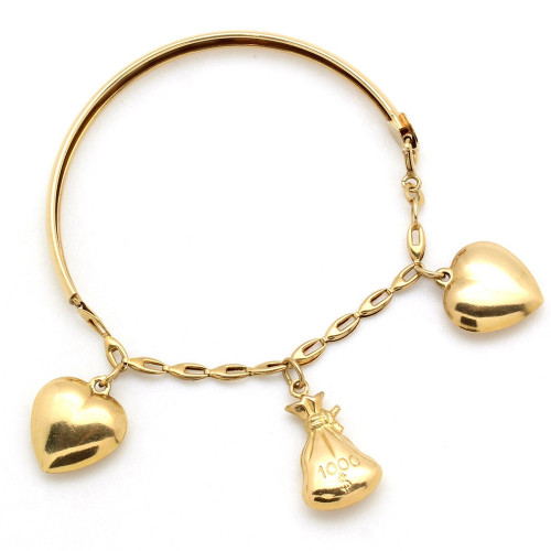 This vintage charm bracelet is made of 14k yellow gold and features three hollow charms that each measure approximately 1″ in length. To know more details please visit here https://eyeonjewels.com/product/vintage-charm-bracelet-19517