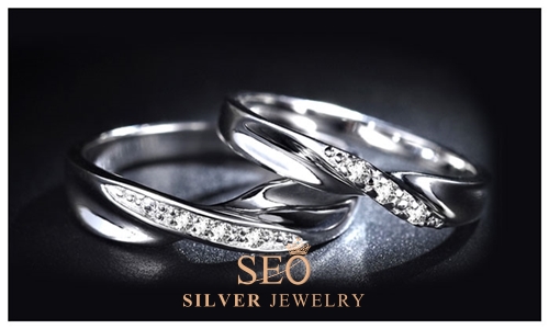 a_twisted_cz_diamond_wedding_rings.jpg