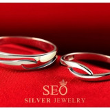 b_silver_open_wave_engagement_rings