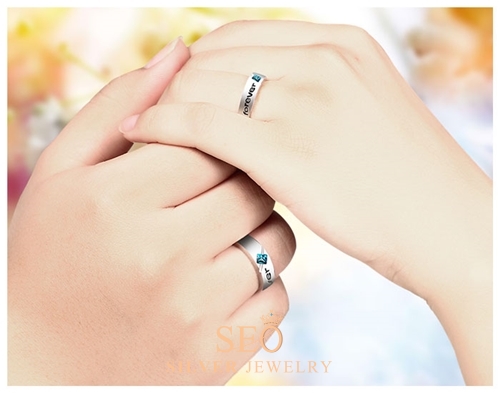 h_forever_engraved_blue_topaz_engagement_rings.jpg